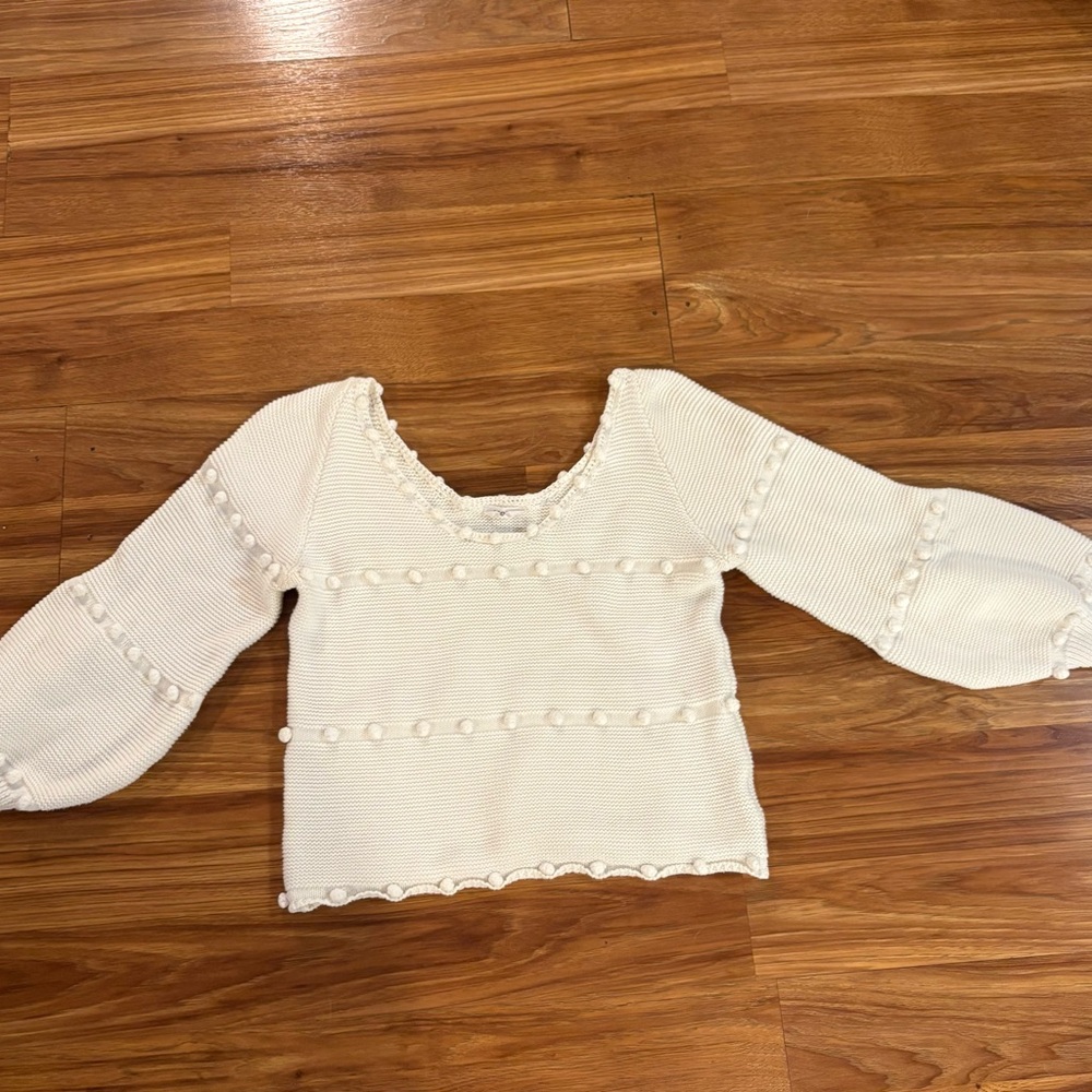 Storia Ivory Cropped Knit Sweater w/ Pom Pom details